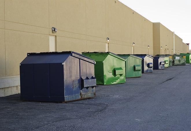 a row of blue construction dumpsters on a job site in Audubon NJ